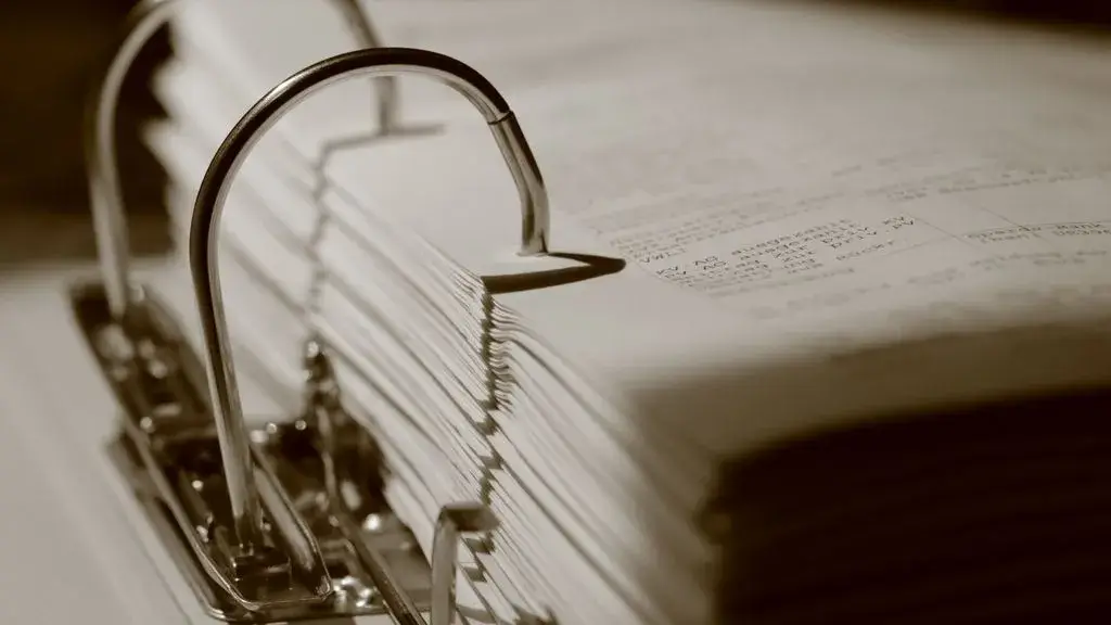 Close-up of a binder with documents